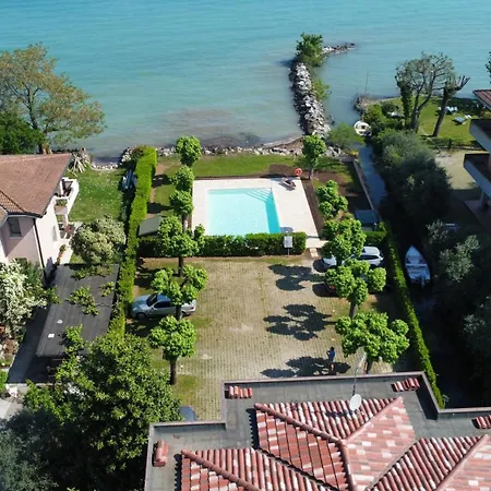 Апартаменты Casa Lugana 9 - Monolocale Con Piscina Fronte Сирмионе